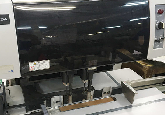 穴あけ用機械